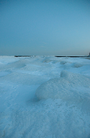 Frozen waves of Lake Michigan, at dusk